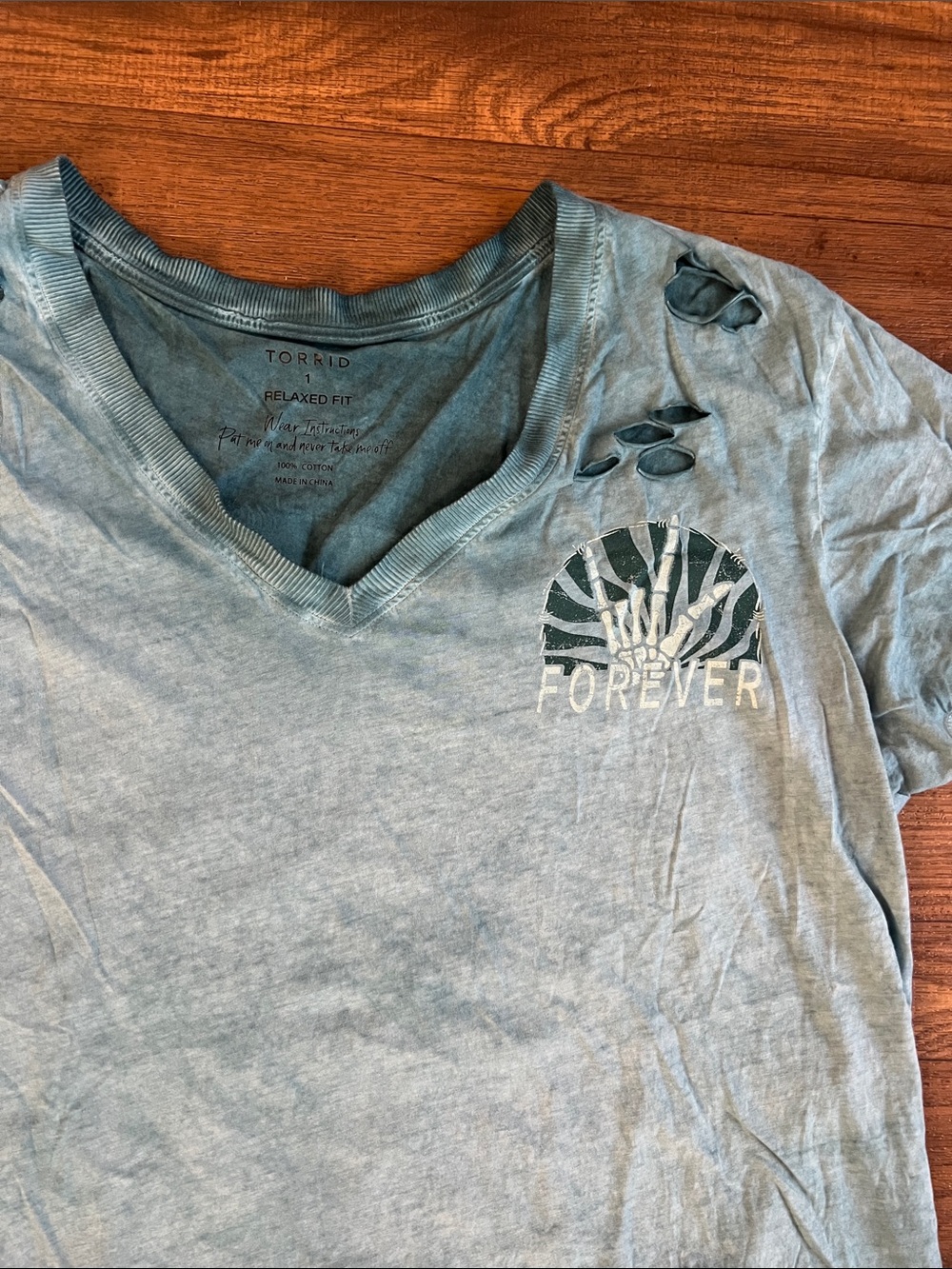 torrid faded blue V-neck graphic tee with cutout detail